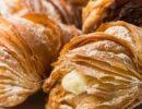 Zu sehen ist das Beitragsbild zum Thema: Sfogliatelle - Süße Köstlichkeit in der Auflösung 900x500